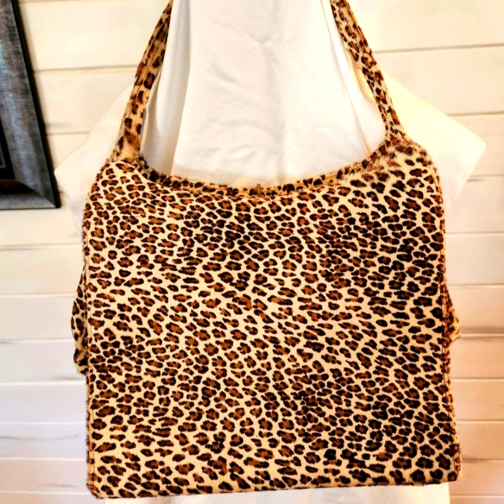 Antique animal skin, satin lined handbag
